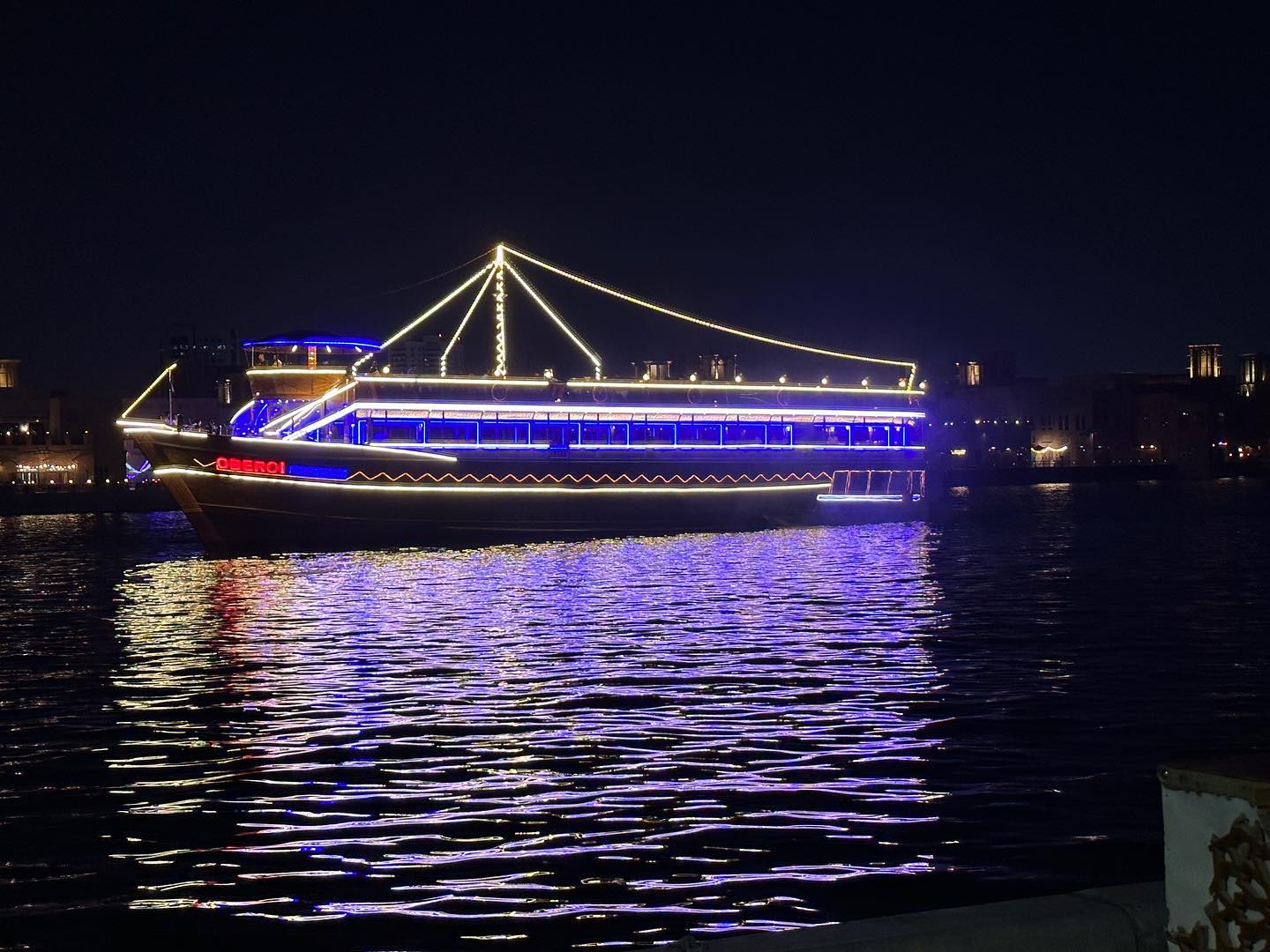 Photo by Muhammad Sadeem Khan in Dhow Cruise – Dubai Creek. May be an image of ship, riverboat, houseboat and suspension bridge.